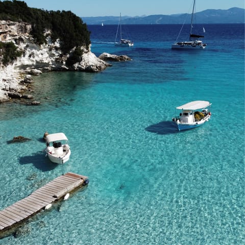 Immerse yourself in the natural beauty of Paxi with its numerous beaches and secret caves