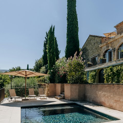 Soak up the sunshine – and the views – lying by the pool