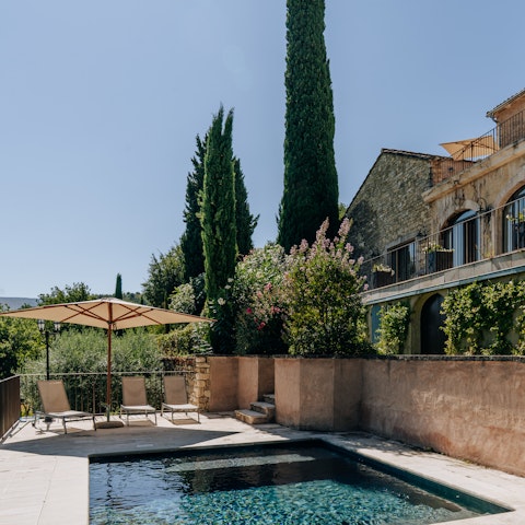 Soak up the sunshine – and the views – lying by the pool