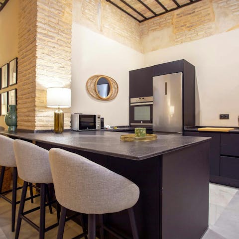 Have some pan con tomate for breakfast at the kitchen bar table