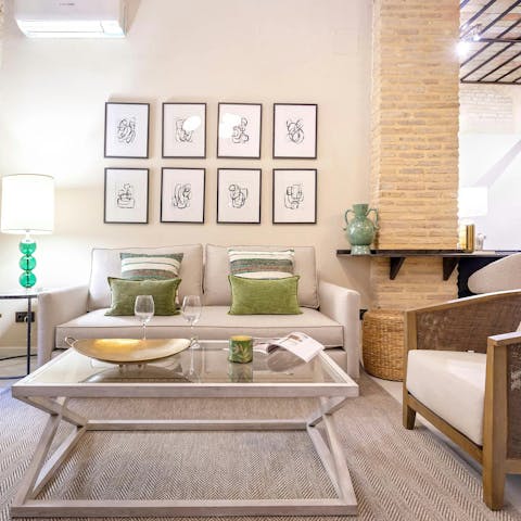 Enjoy a cool glass of tinto de verano on the comfy sofa