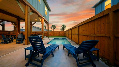 Take an evening dip beneath the sunset sky
