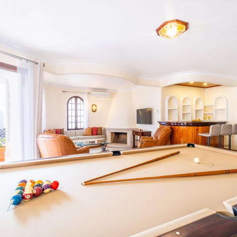 Head down to the basement for a game of pool and a drink at the bar