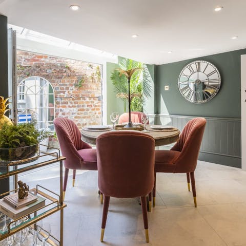 Enjoy atmospheric evenings gathered around the elegant dining table