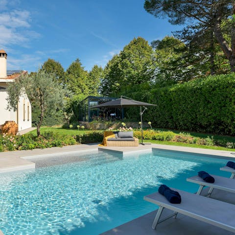 Feel the tension slip away as you soak up the sun beside the pool