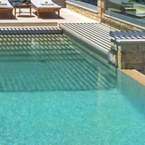 Make a splash in the private swimming pool