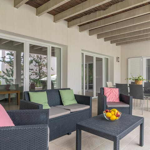 Spend evenings sipping Spanish wine at the outdoor lounge area