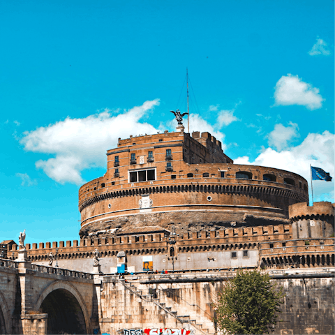 Meander across the bridge to Castel Sant'Angelo – it's a short walk away