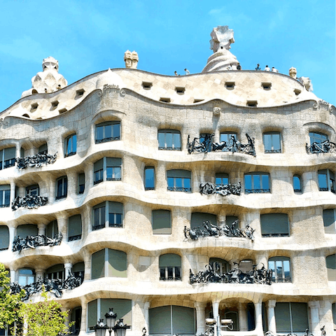 Take a five-minute stroll to Casa Milà and head up to its iconic roof terrace