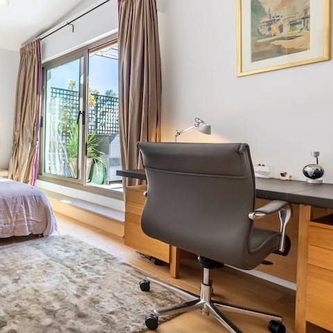 Find a quiet spot to catch up on work at the desk