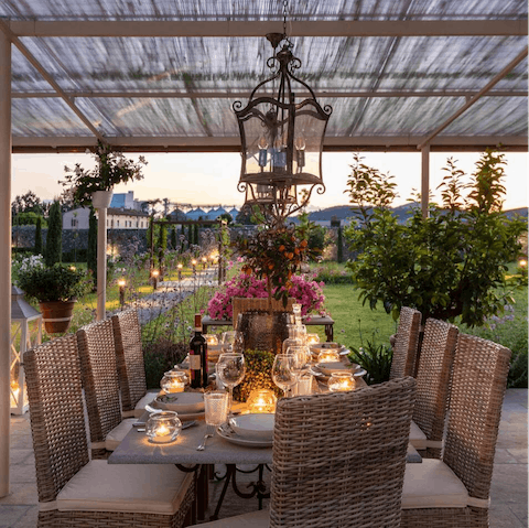 Dine alfresco with gorgeous views under the pergola