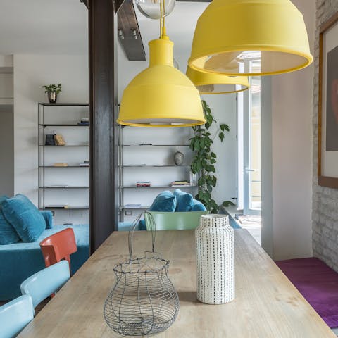 Savour your meals at the technicolour dining table