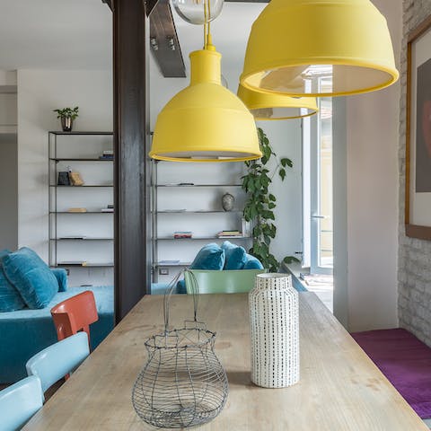 Savour your meals at the technicolour dining table