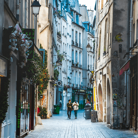 Embrace timeless Parisian charm while strolling through Le Marais