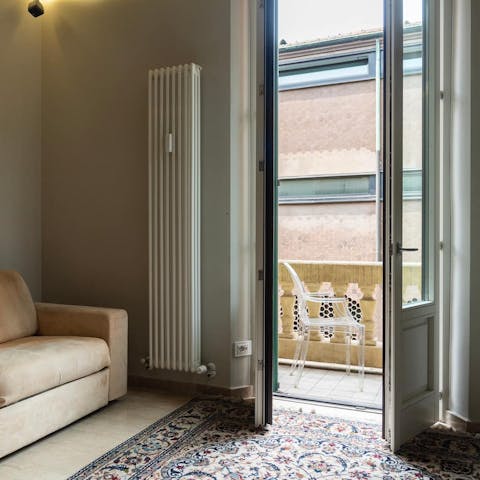 Head out onto the balcony with a morning coffee