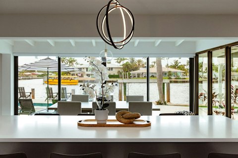Dine with a front-row view of the waterway just beyond the glass