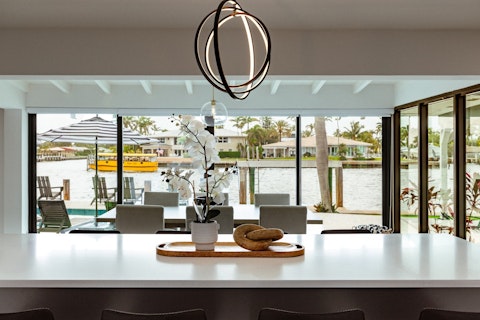 Dine with a front-row view of the waterway just beyond the glass
