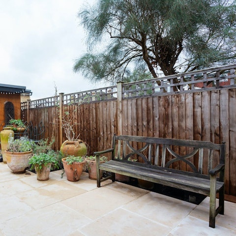 Catch the last of the day's sunshine with drinks in the private garden