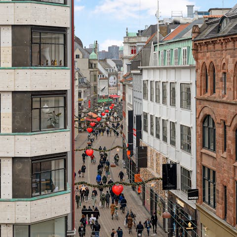 Look out over the city's main shopping street, Strøget