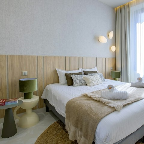 Curl up in a comfy queen size bed after a day exploring