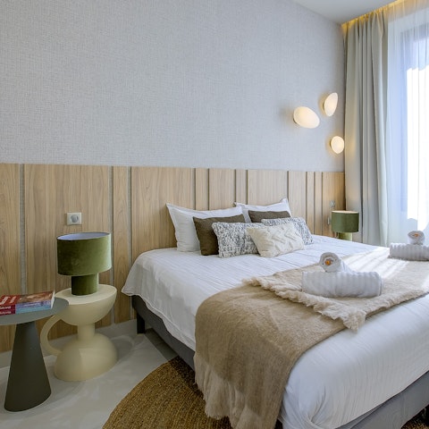Curl up in a comfy queen size bed after a day exploring