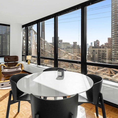 Tuck into dinner with views of Ed Koch Queensboro Bridge from your window