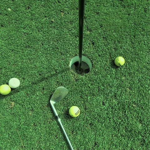 Tee off at the resort's renowned 18-hole golf course