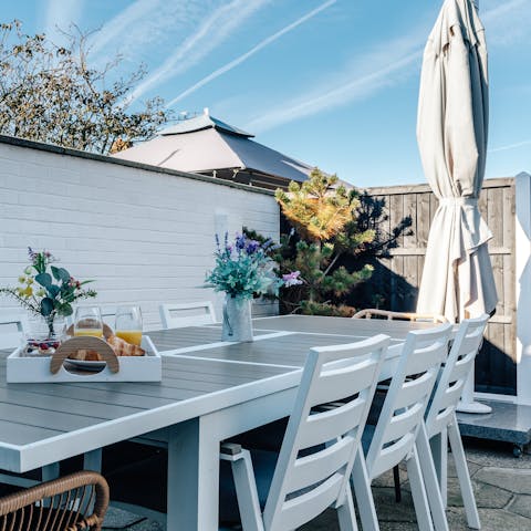 Wake up with breakfast on the patio while listening to the seagulls cry