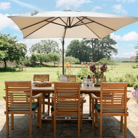 Enjoy idyllic views from the patio while dining alfresco