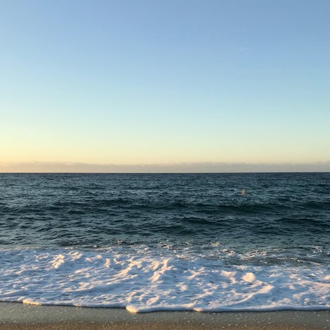 Watch the sunset on Mare Nostrum Beach, a short walk away