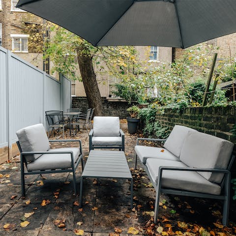 Wind down after sightseeing with a glass of wine in the private garden