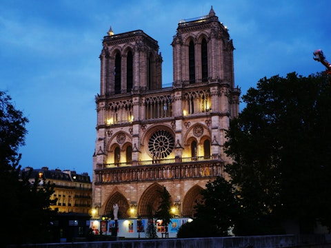 Marvel at Notre-Dame Cathedral's breathtaking Gothic architecture on Île de la Cité, roughly a fifteen-minute drive