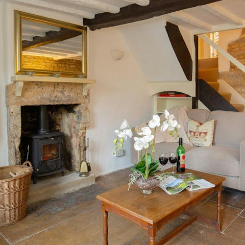 Cosy up by the wood burner after a day exploring the Cotswolds