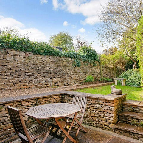 Crack open a bottle of wine to toast your holiday in the quaint garden