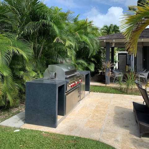 Indulge in some cou-cou and fried flying fish in the outdoor kitchen