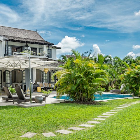 Spend the afternoon sunbathing by the private pool