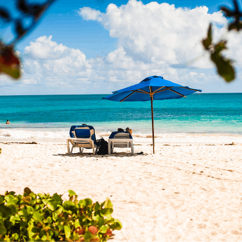 Sink your toes in the white sand at one of the nearby beaches