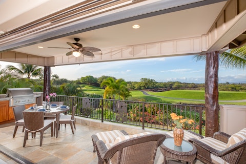 Barbecue on the lanai as greens stretch out below