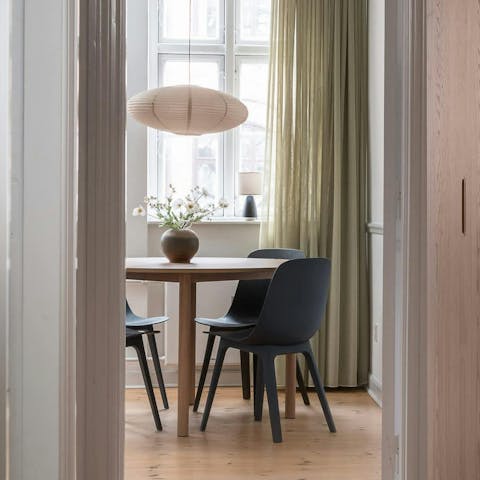 Nibble on Danish pastries around the dining table