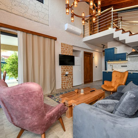 Snuggle up and watch flicks in the cosy living area