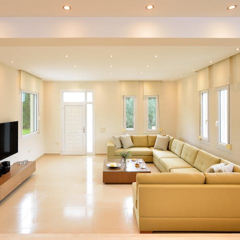 Get comfy on the living room's huge sofa