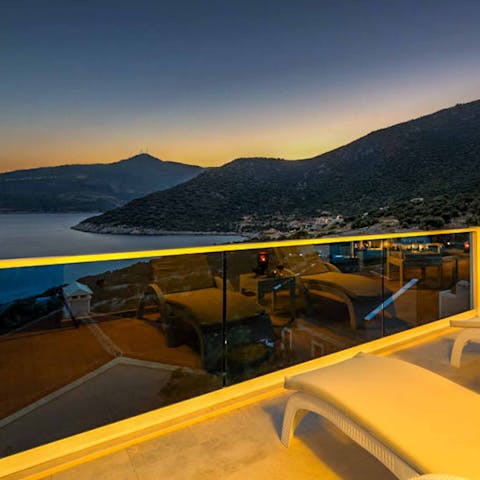 Watch the sunset with a cocktail in hand