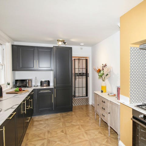 Rustle up a full English breakfast in the sleek kitchen before a day of exploring