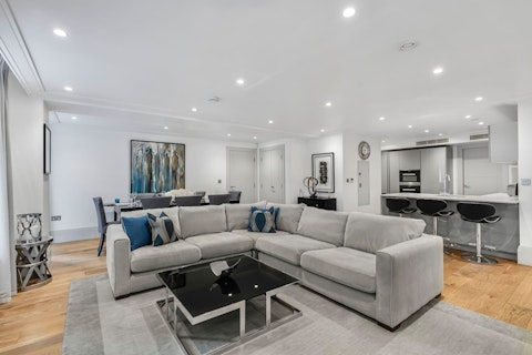 Curl up in the corner sofa in the calm, cosy living room