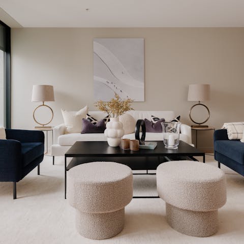 Relax in the apartment's living room, with its effortless Scandinavian style