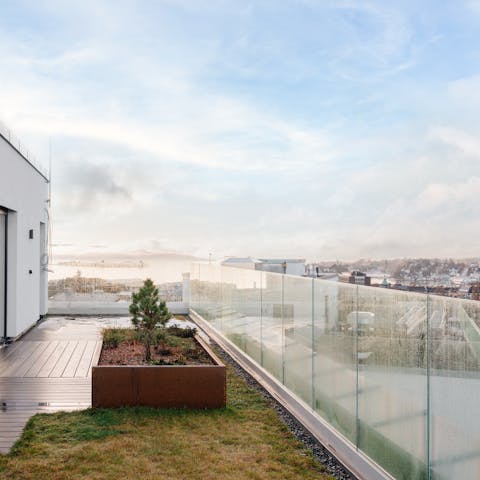 Take your morning coffee out on the morning terrace and look out across Oslo
