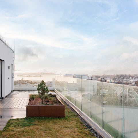 Take your morning coffee out on the morning terrace and look out across Oslo