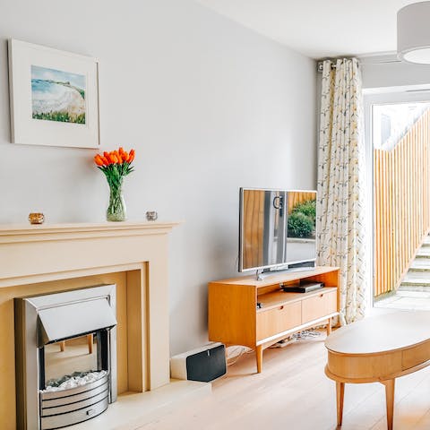 Curl up in the bright and cosy living room after a day discovering Newquay