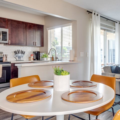 Get together for a tasty lunch around the stylish dining table