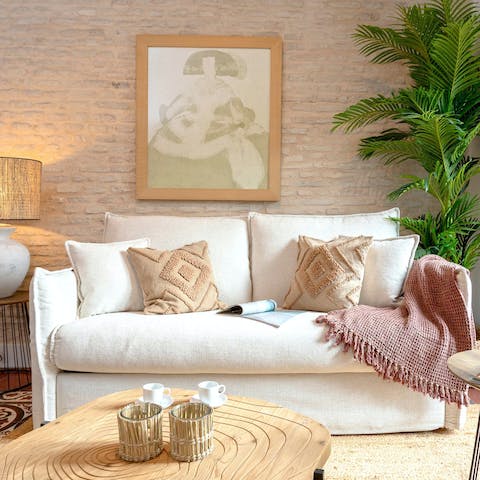 Kick back in the boho living area with a glass of Spanish wine